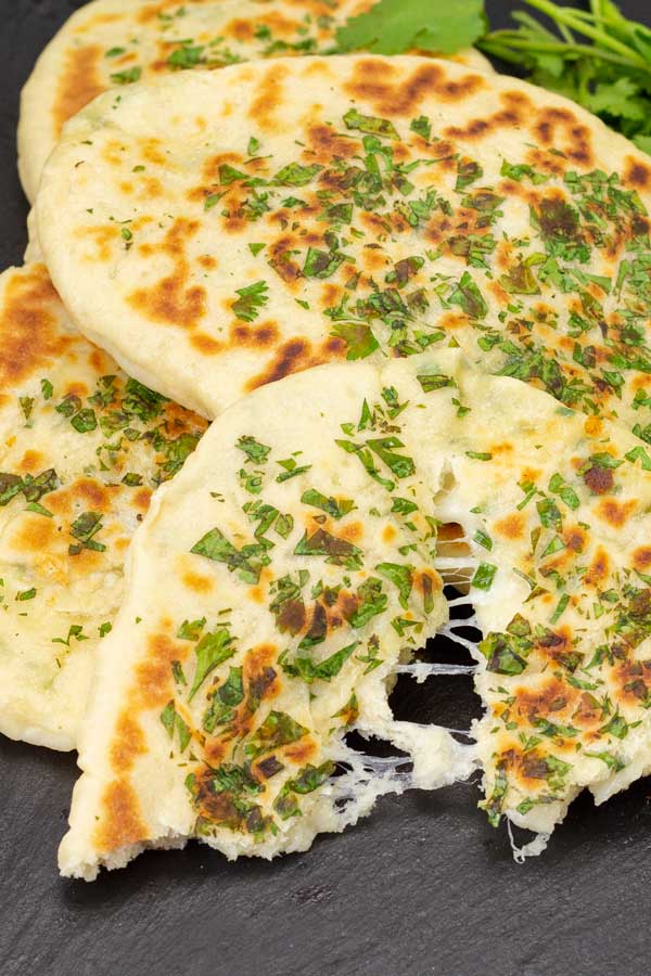 Easy homemade cheese naan cooked in a skillet