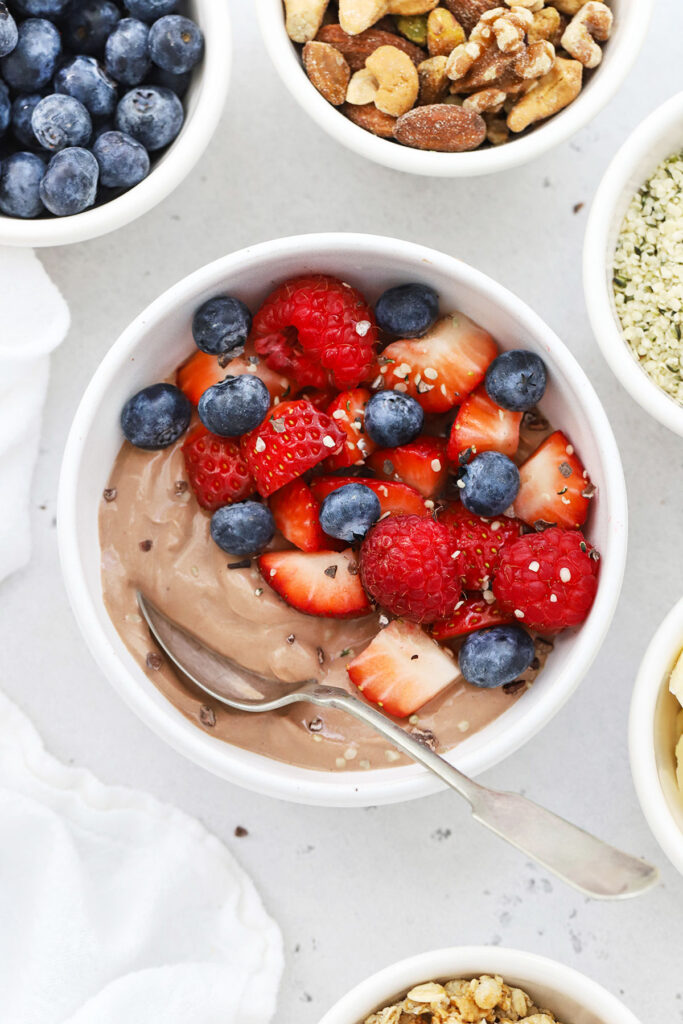 High protein Greek yogurt bowl with fresh fruit and toppings