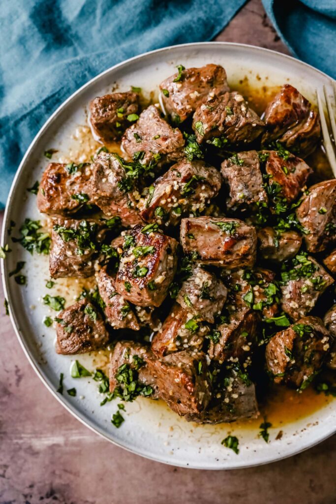 High protein garlic butter beef bites cooked in garlic butter sauce