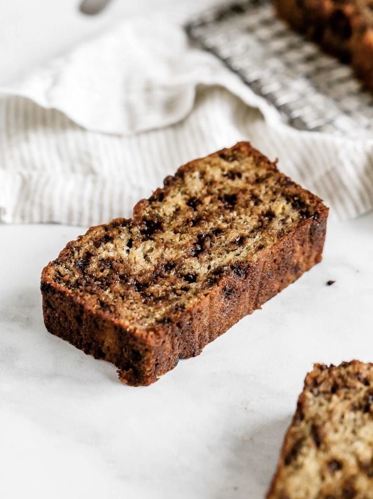 Slice of chocolate chip banana bread with chocolate chips