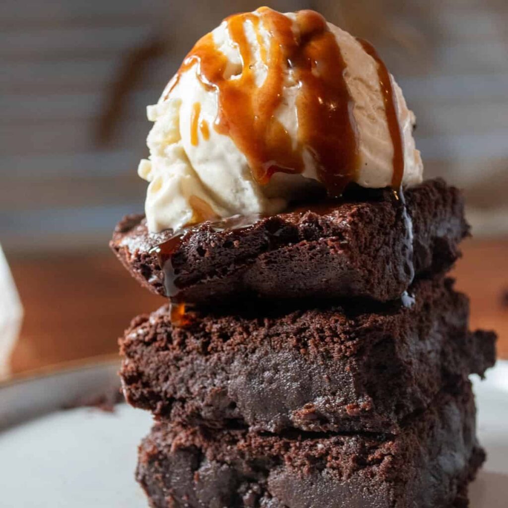 Fluffy fudgy brownies served with vanilla ice cream