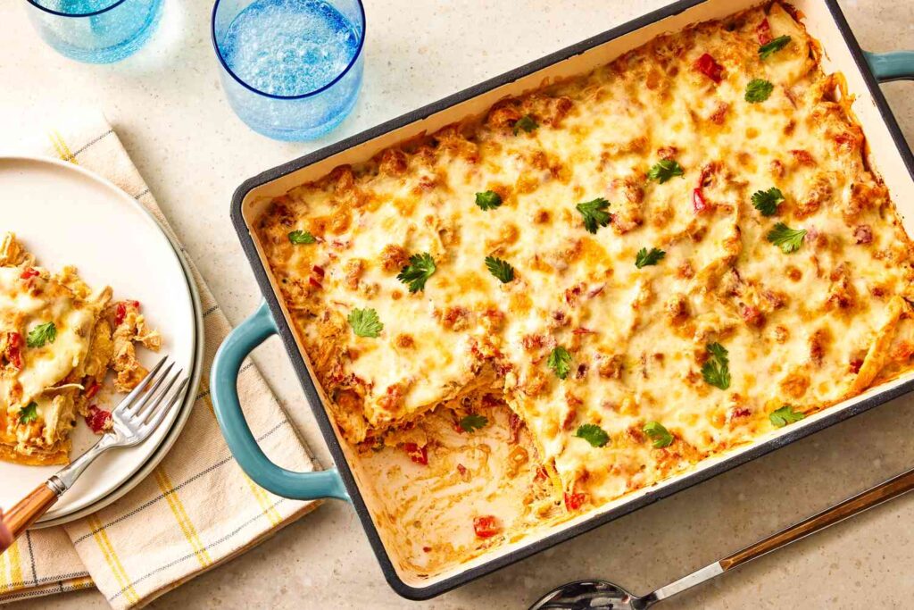Slice of King Ranch chicken casserole with melted cheese